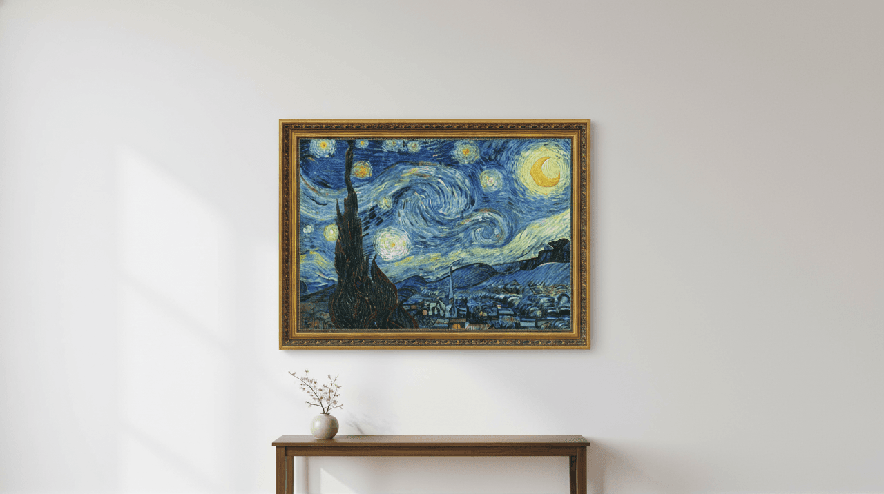 Museum Black picture frame displaying iconic Starry Night inspired oil painting with swirling blue night sky golden stars crescent moon cypress tree and village below on neutral wall with dramatic window light shadows above wooden console table with minimalist décor demonstrating exquisite ornate gold finish with museum-quality 1.125 inch moulding and elegant black accent detailing for post impressionist artwork Van Gogh inspired paintings and classical masterpiece reproduction framing