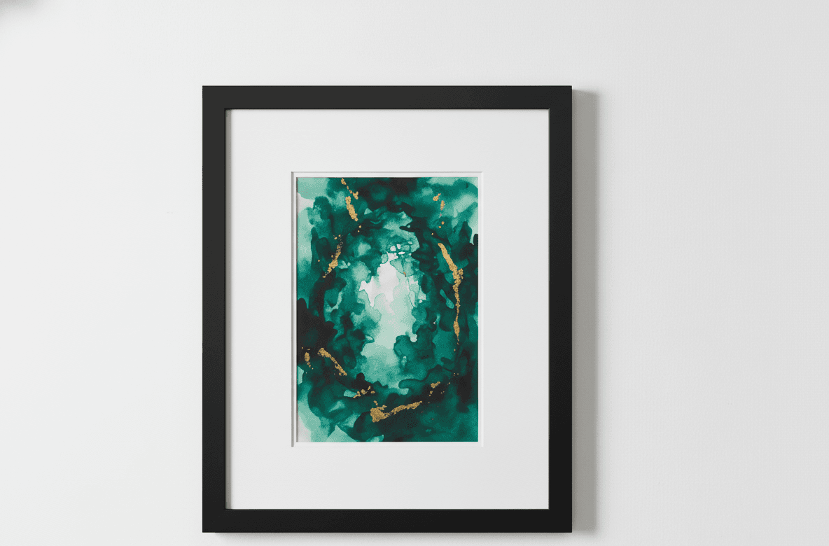 Black Wood custom picture frame with white mat displaying dramatic emerald teal and turquoise abstract watercolor painting with gold metallic accents mounted on pristine white wall in minimalist gallery setting demonstrating clean contemporary framing for fluid art and abstract alcohol ink paintings with professional museum-quality presentation