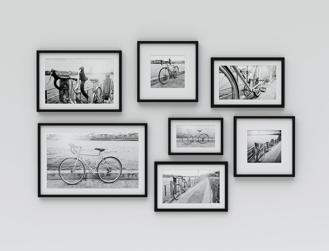 Custom framed photography displayed in coordinated gallery wall layout