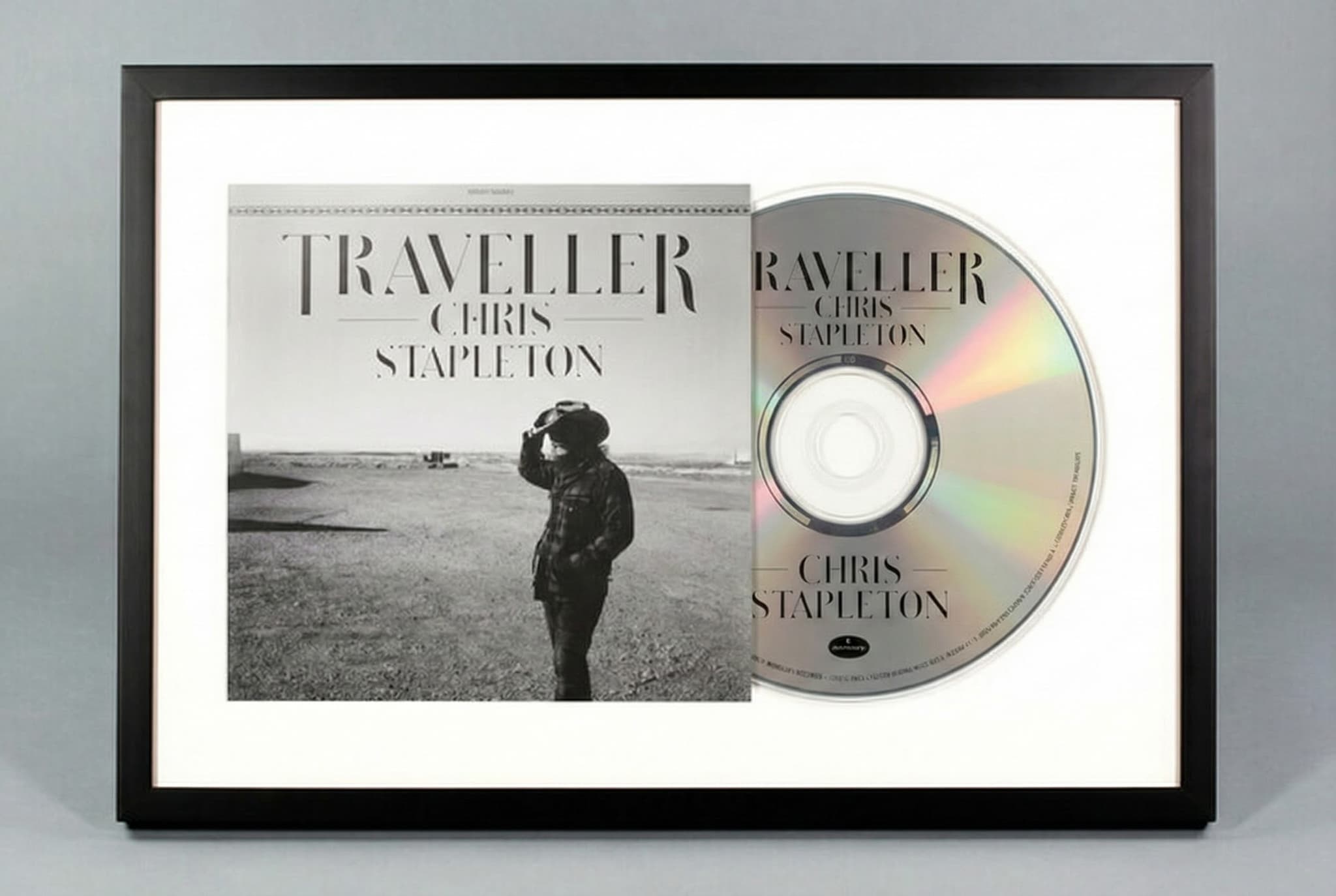 Close-up of custom CD frame showing archival mat board and Frame Shop Quality Acrylic glazing